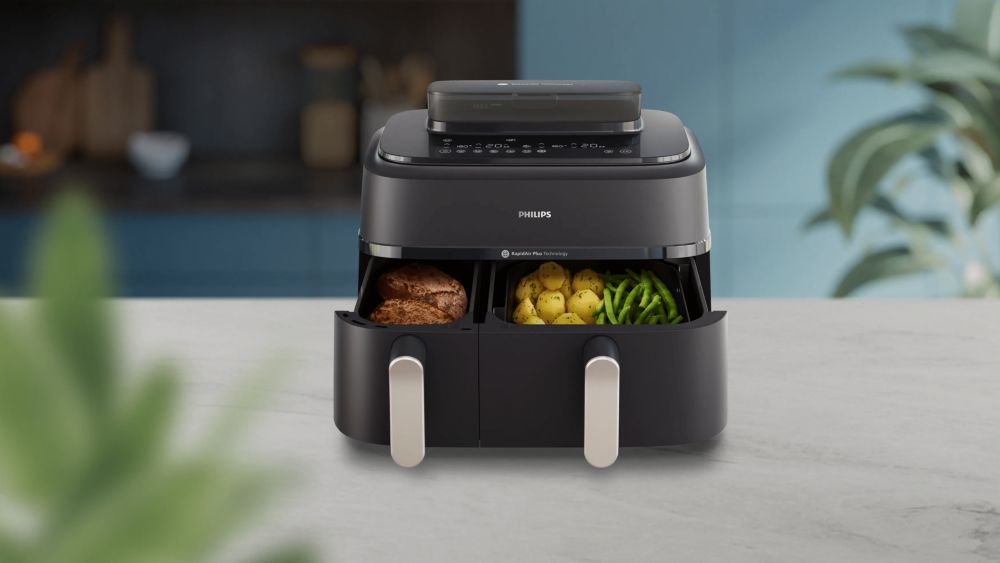 Philips 5000 Series NA551/00, NA552/00 en NA555/00 met twee geopende manden en bereide maaltijd