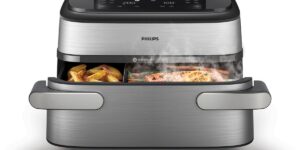 Philips NA565/02 met friet en zalm-groenten in twee gesynchroniseerde kookzones