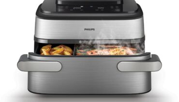 Philips NA565/02 met friet en zalm-groenten in twee gesynchroniseerde kookzones